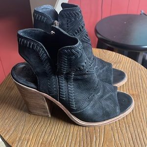 Vince Camuto size 8 used and wear on the back of the heels. See pictures. Black